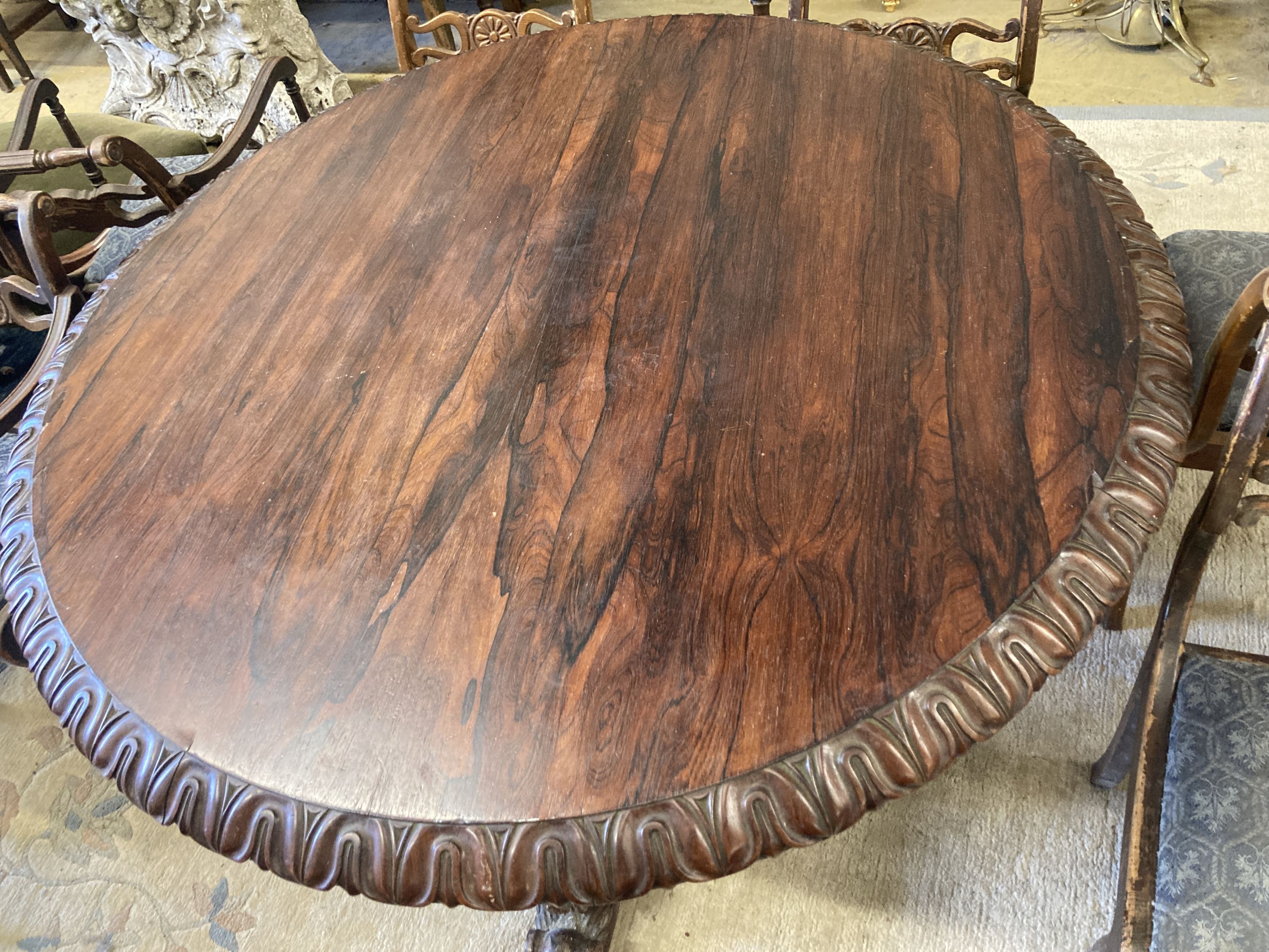 A George IV circular rosewood tilt top breakfast table, 138cm diameter, height 72cm